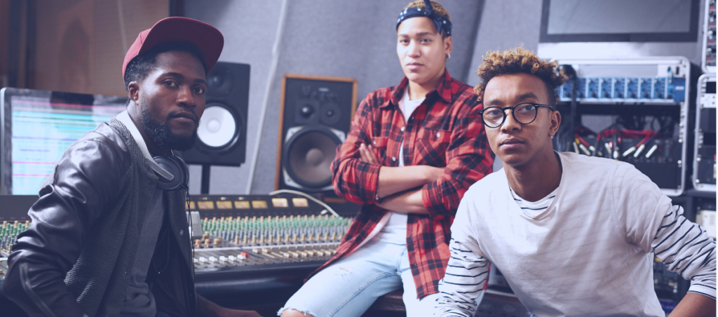 003-music-unclaimed-royalties-leftbrain Three music creators in a recording studio
